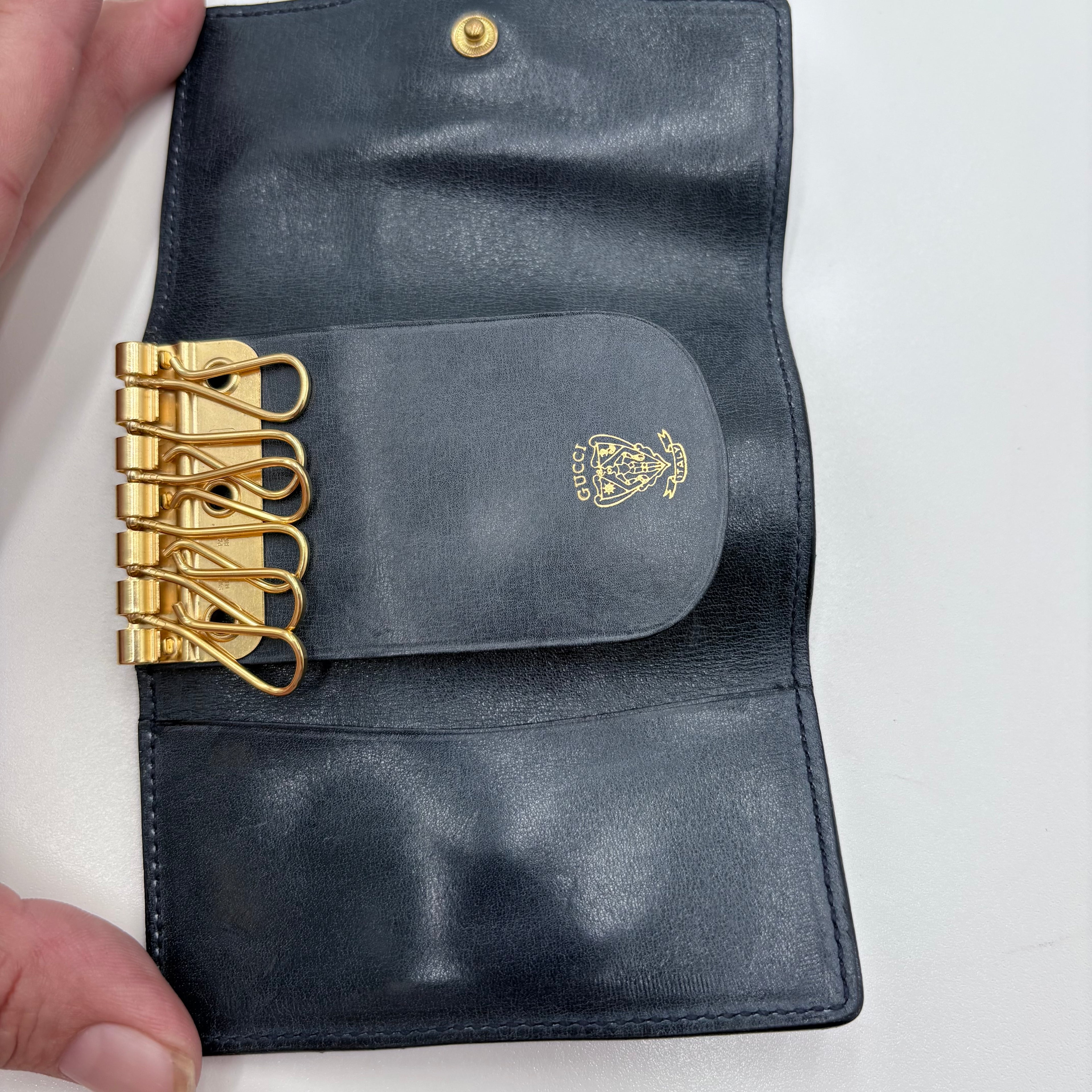 Authenticated Gucci key holder