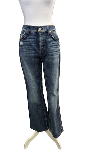 Blue jeans on a mannequin against a white background