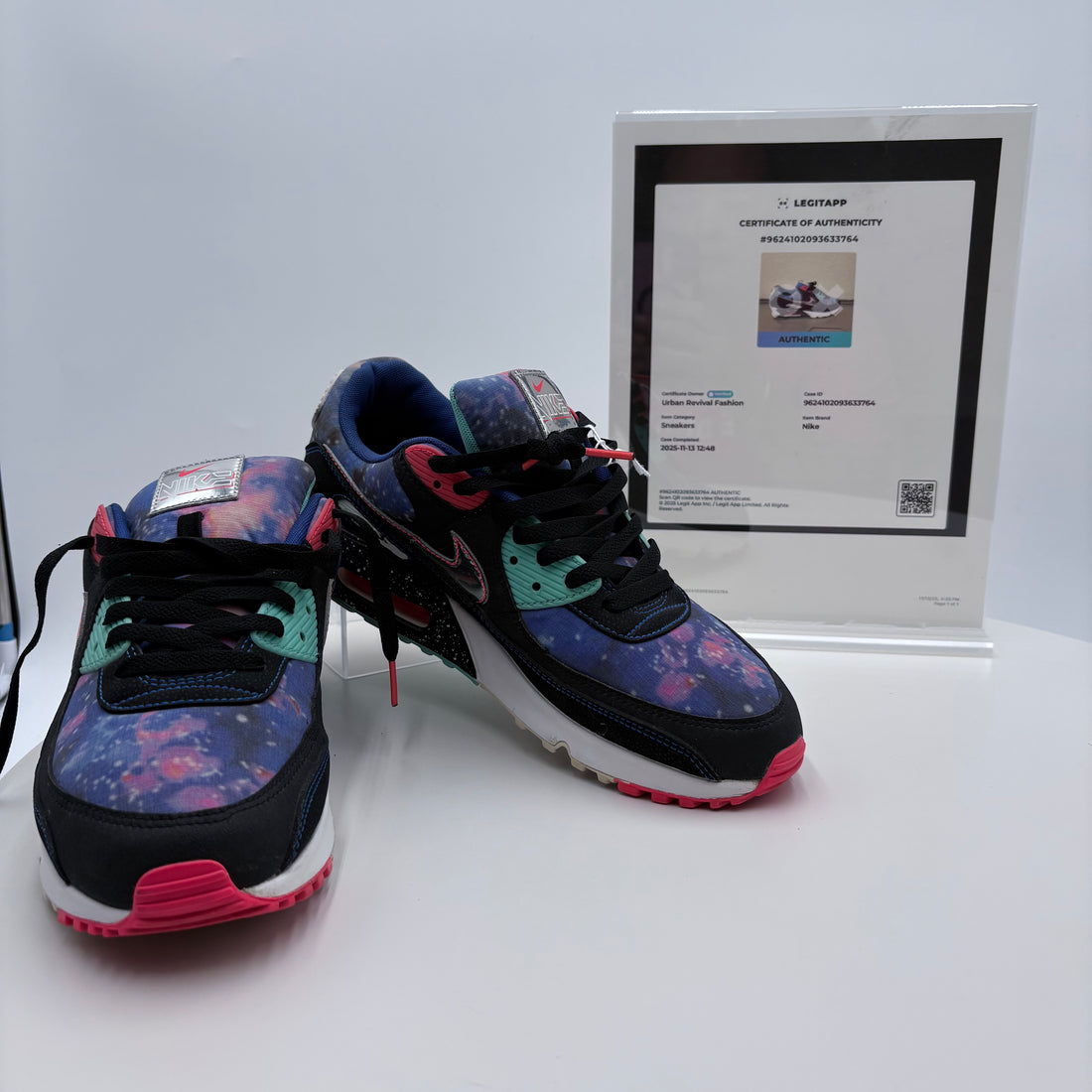 Colorful sneakers with a certificate of authenticity on a white background