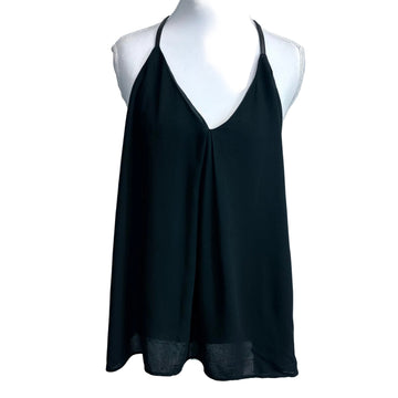 Black tank top on a mannequin against a white background