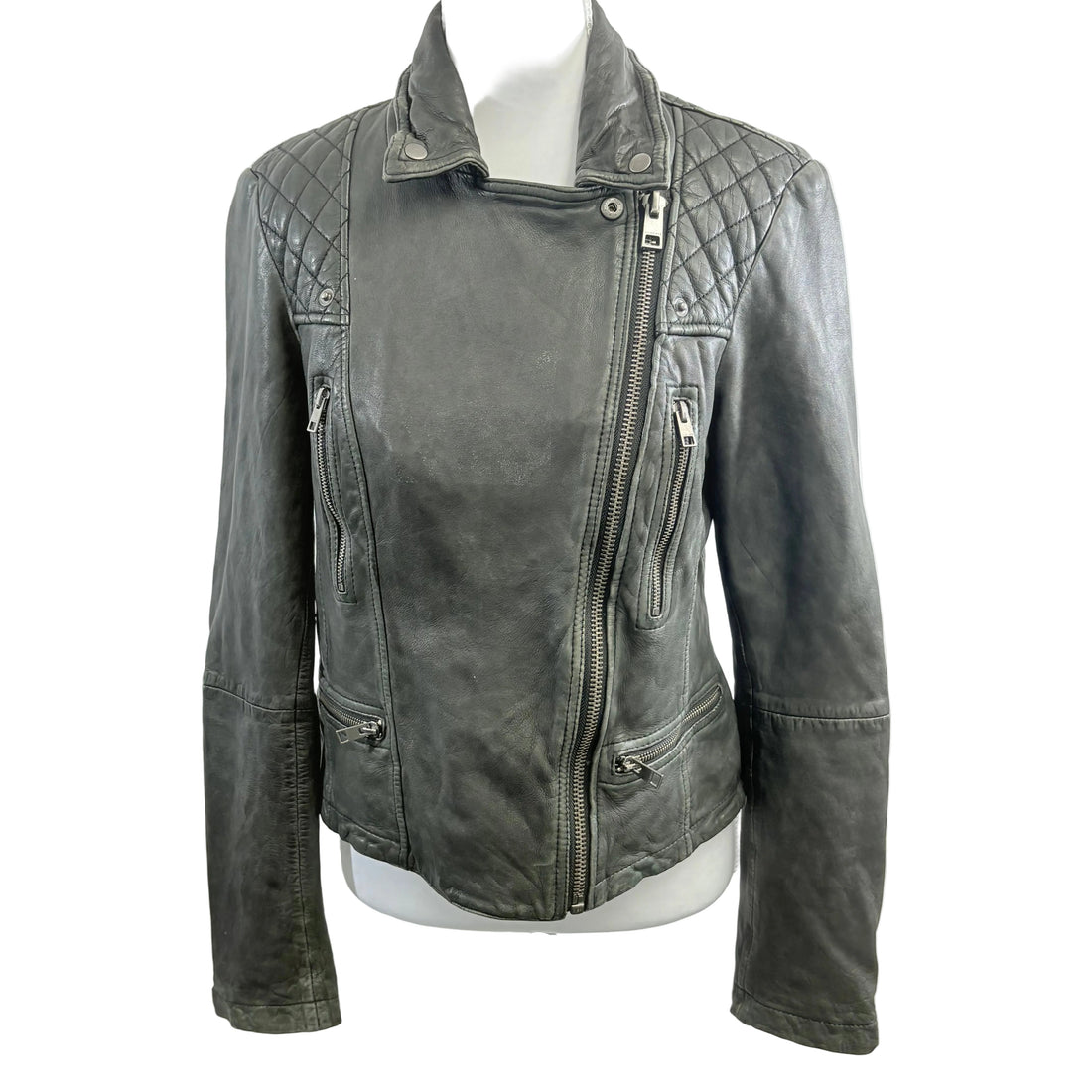 Gray leather jacket on a mannequin against a white background
