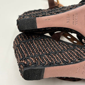 Close-up of woven sandals with a white background