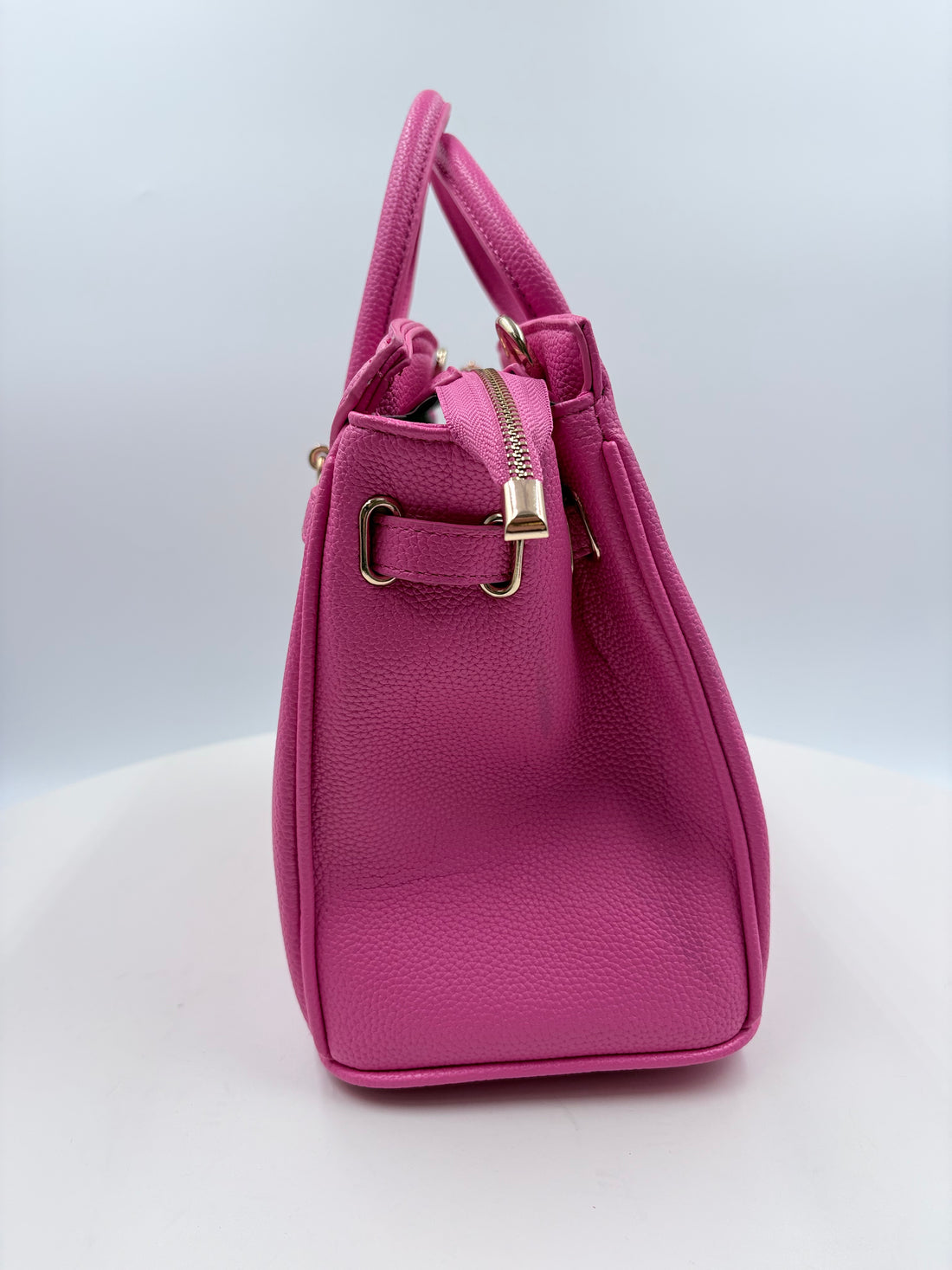 Unbranded pink handbag w/crossbody strap