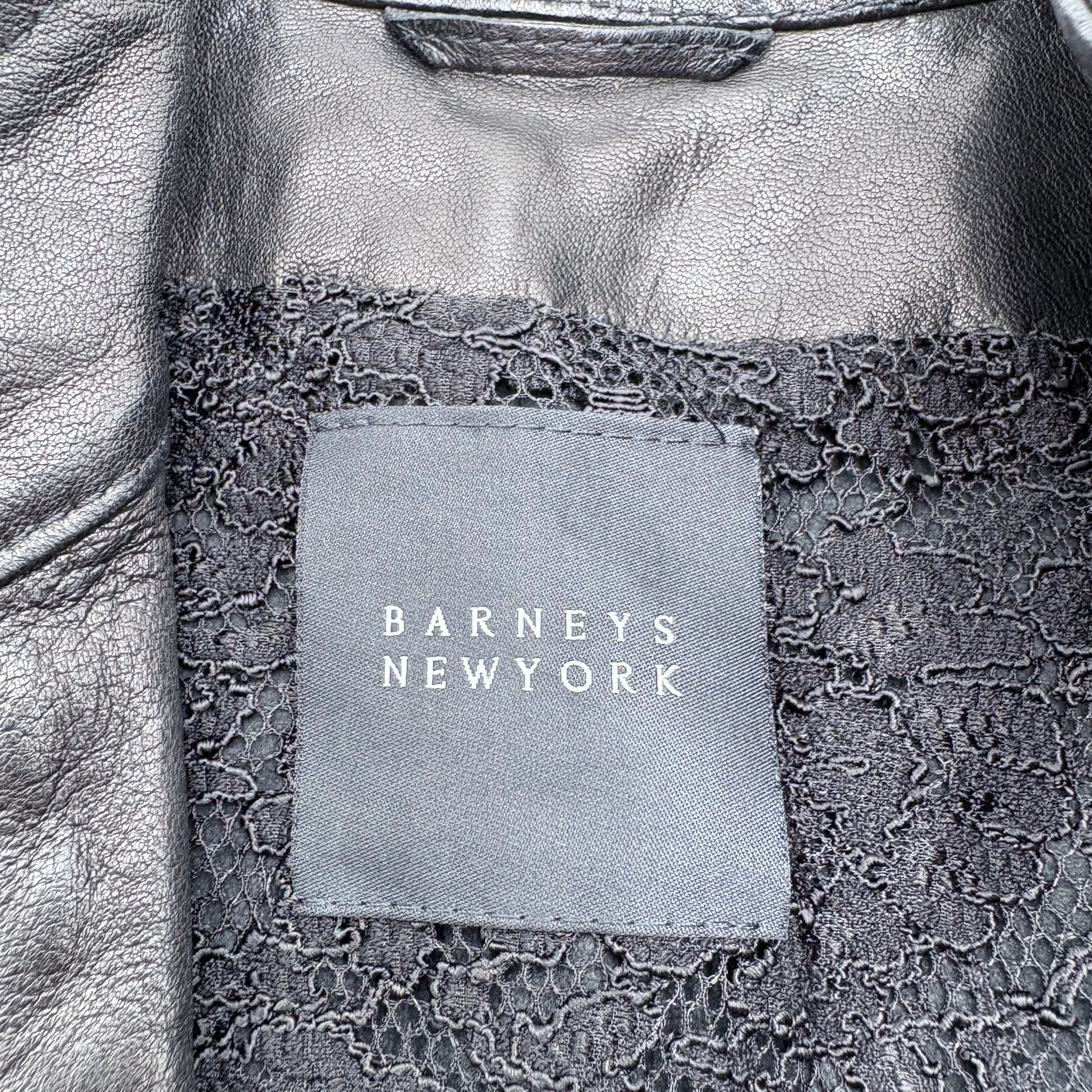 Barneys New York label on a textured leather surface