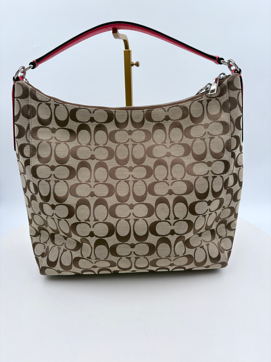 Authenticated Monogram Coach shoulder bag