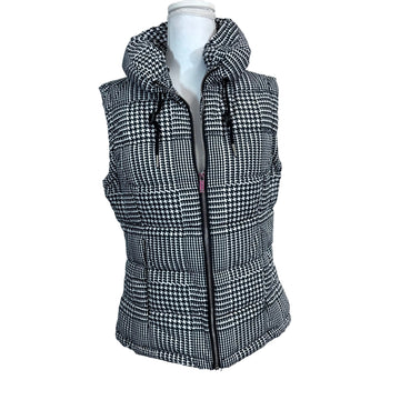 Houndstooth patterned vest on a mannequin against a white background