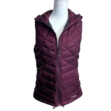 Maroon quilted vest on a mannequin against a white background