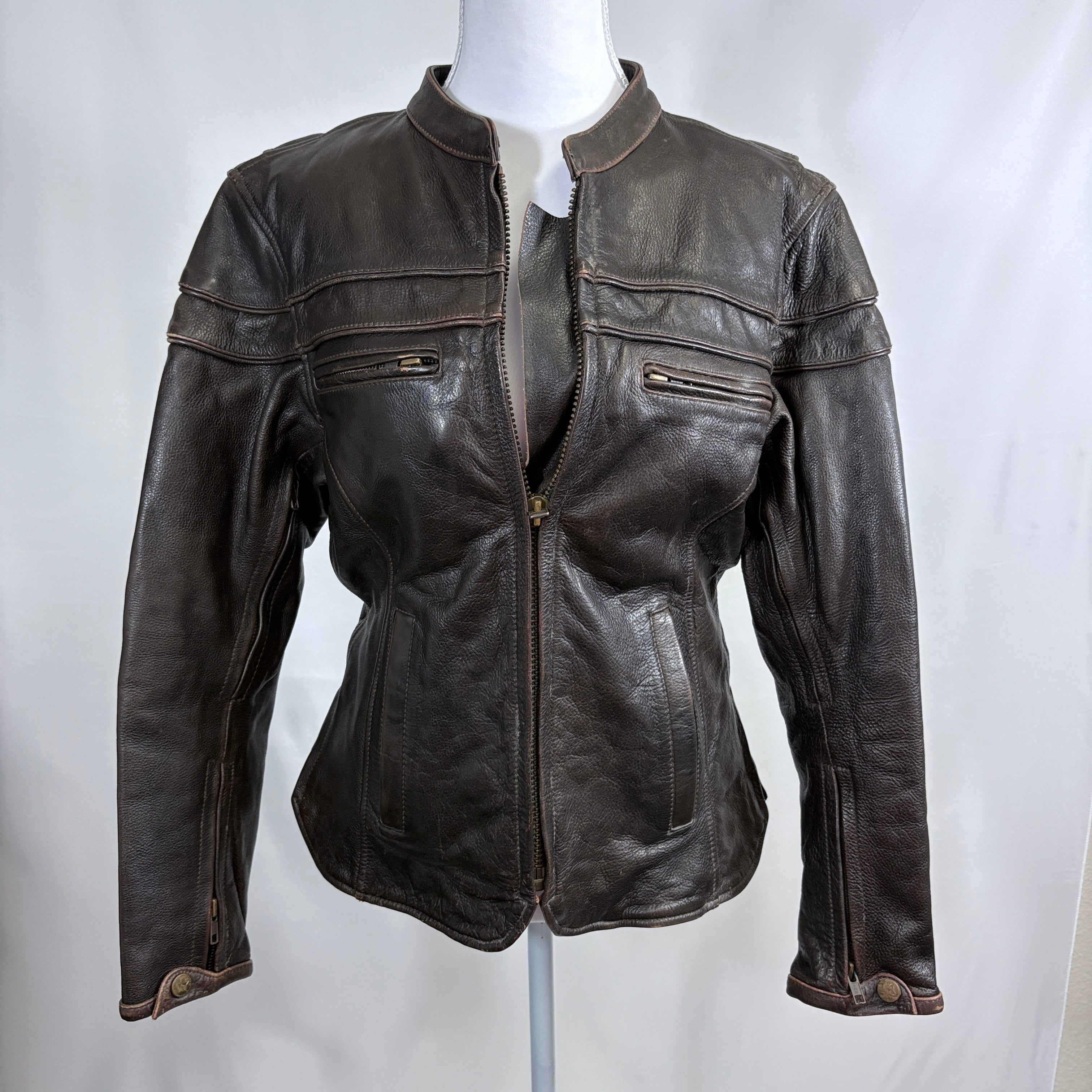 Brown leather jacket on a mannequin against a white background