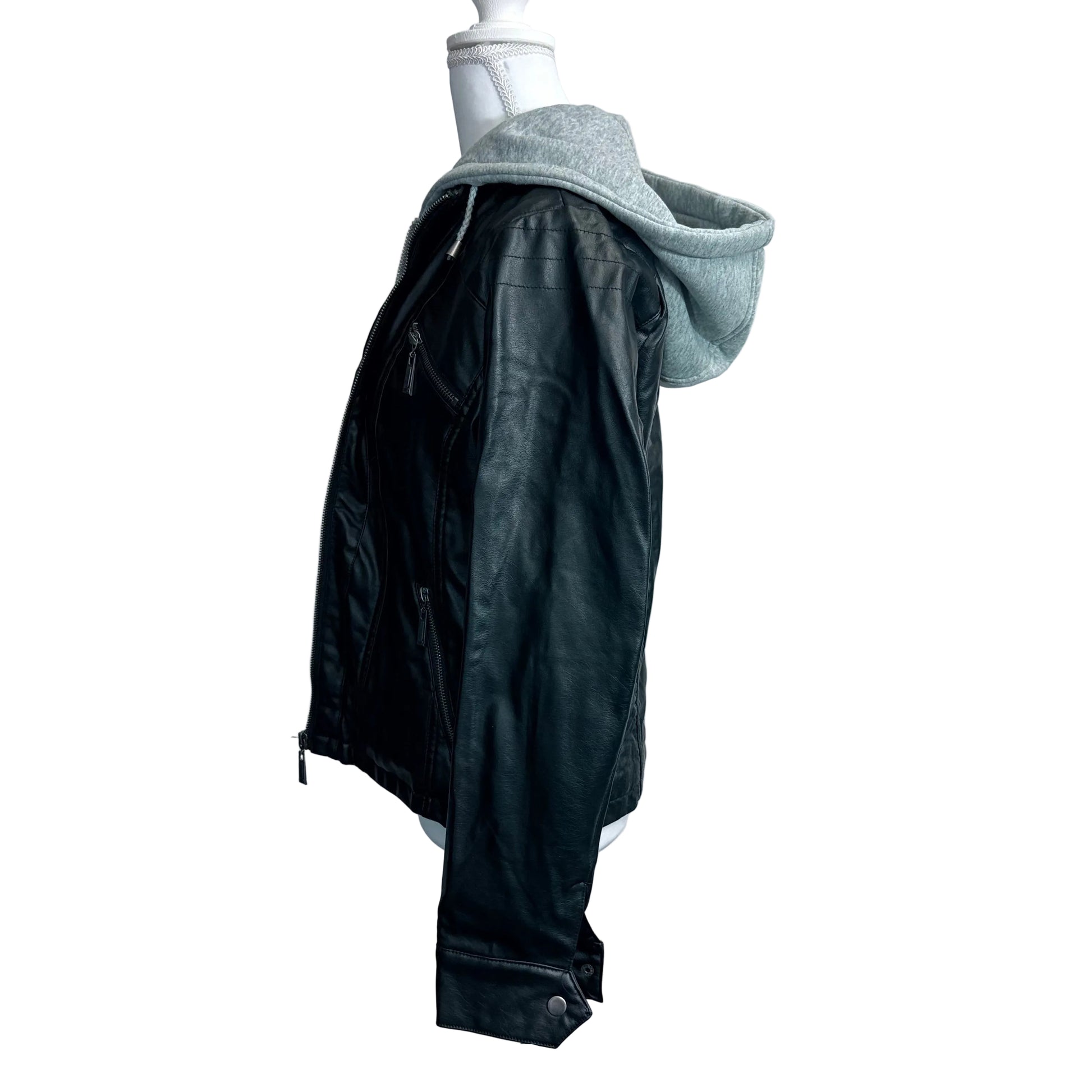 Black jacket with gray hood on a mannequin against a white background