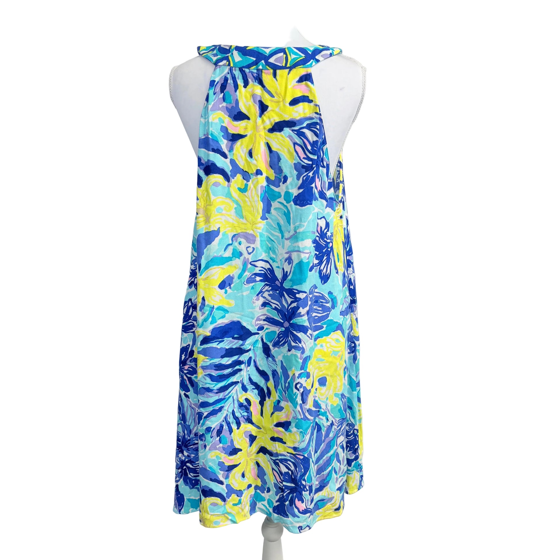 Blue and yellow floral dress on a mannequin against a white background