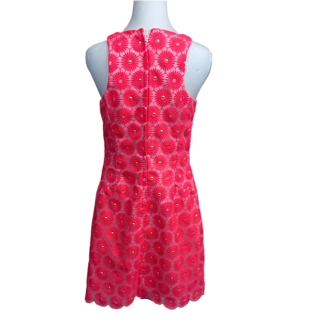 floral patterned dress on a mannequin against a white background