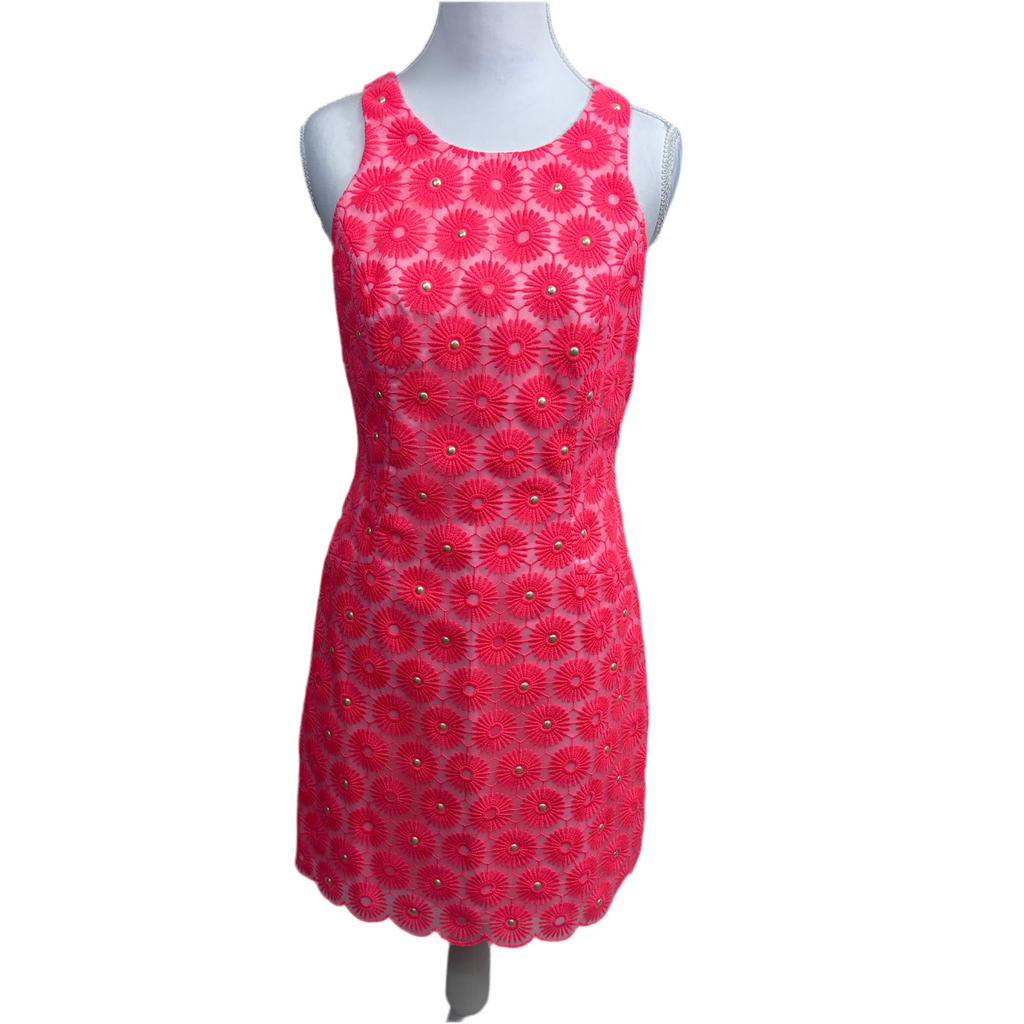 floral patterned dress on a mannequin against a white background