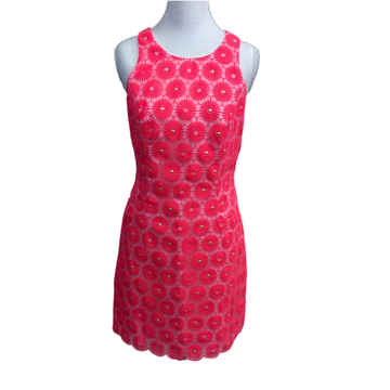 floral patterned dress on a mannequin against a white background