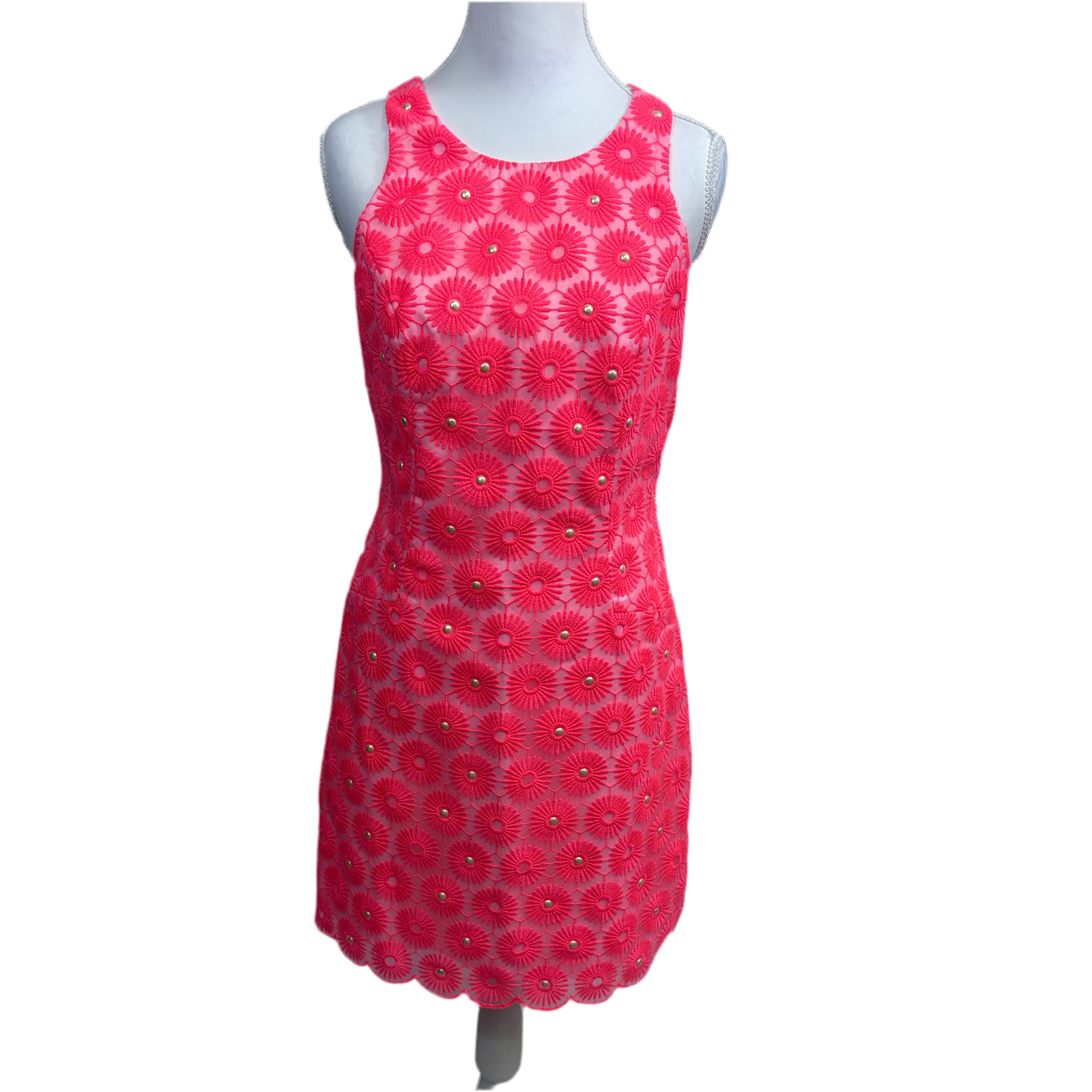 floral patterned dress on a mannequin against a white background