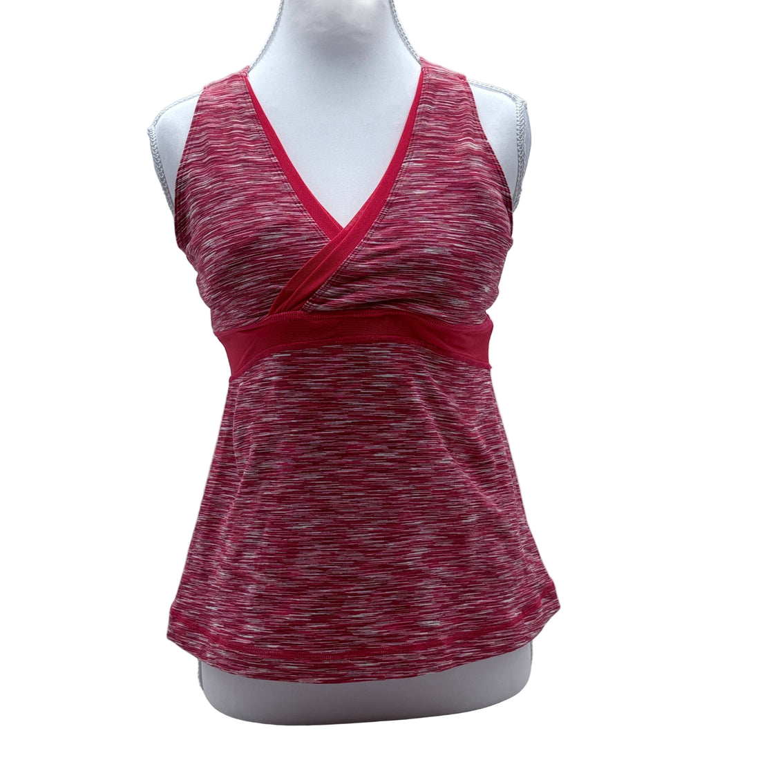 Red and gray patterned tank top on a mannequin against a white background