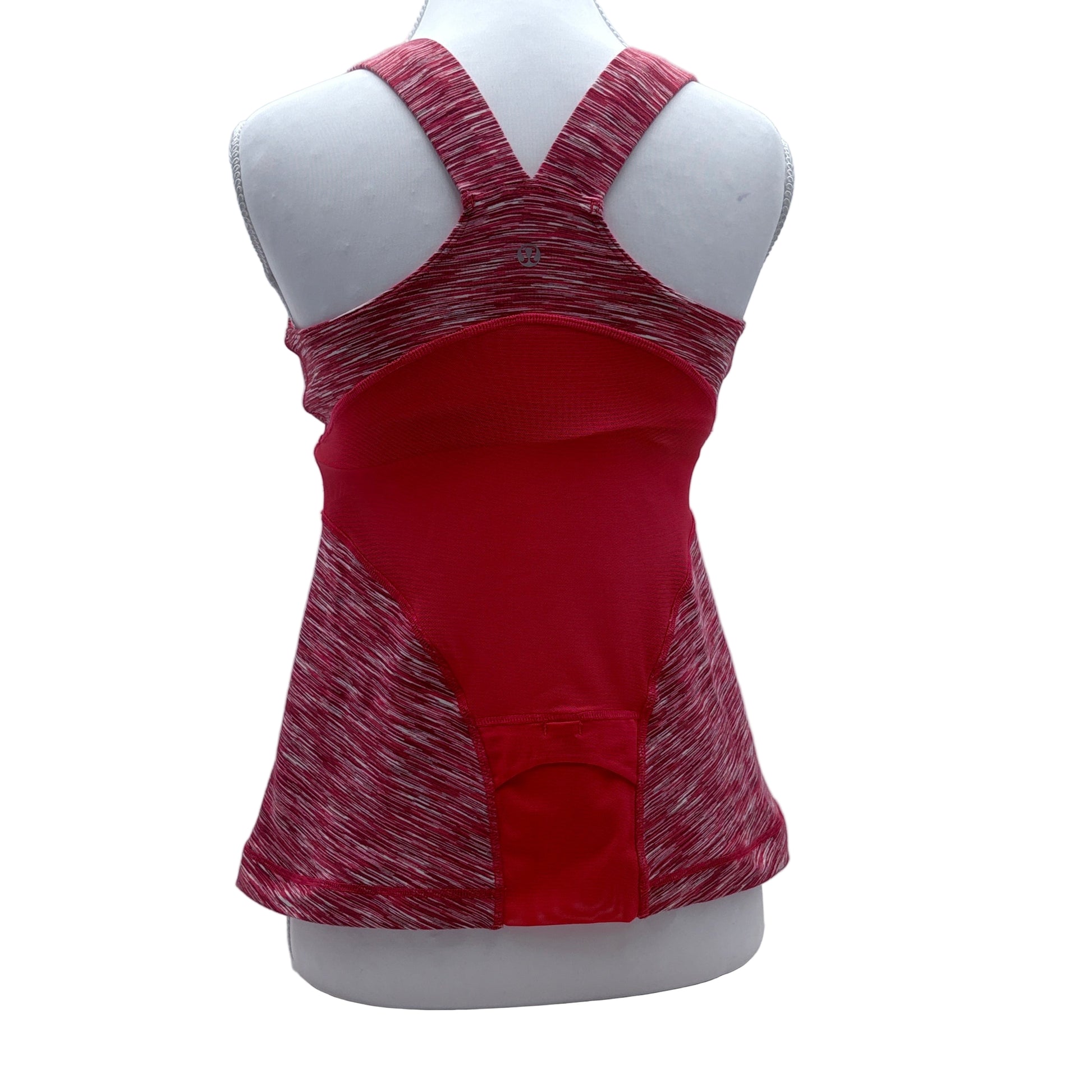 Red and white tank top on a mannequin against a white background