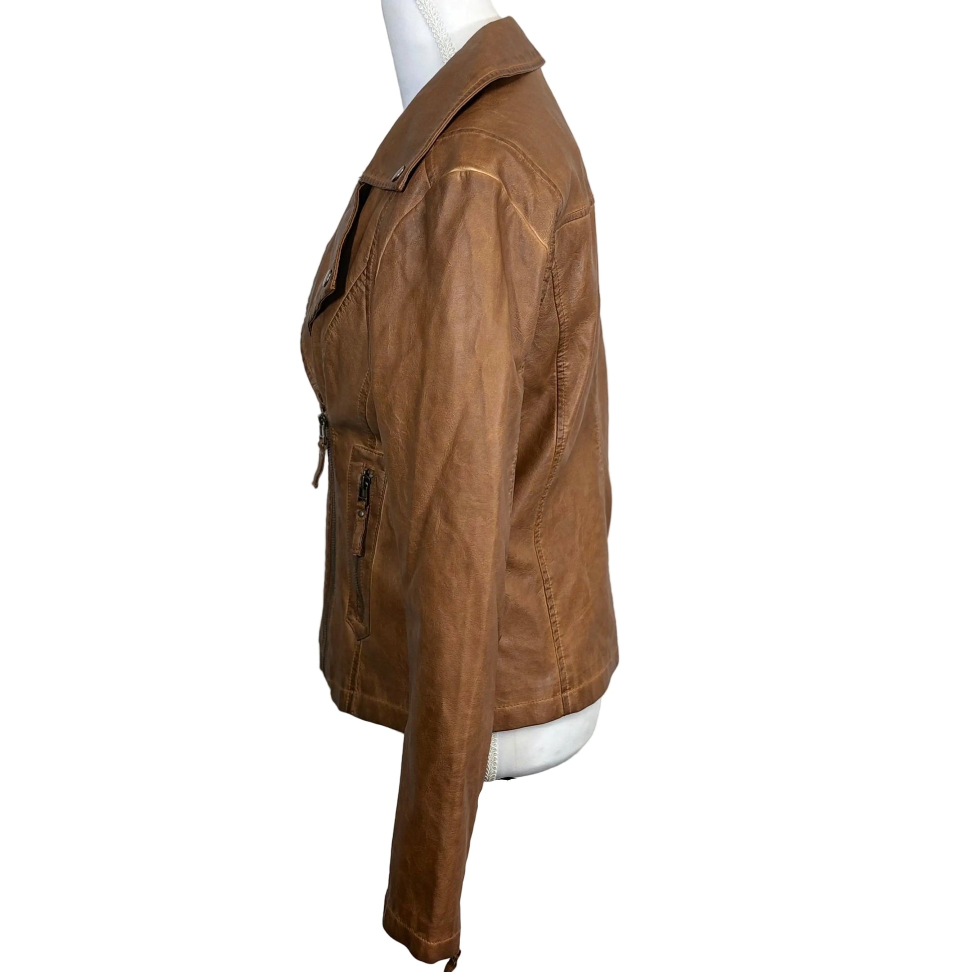 Brown leather jacket on a mannequin against a white background