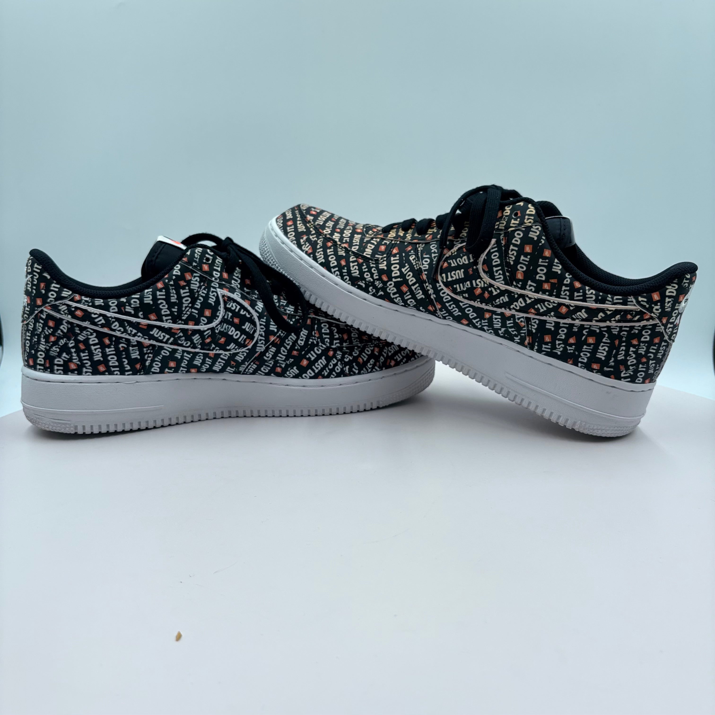 Black and white patterned sneakers on a light gray background