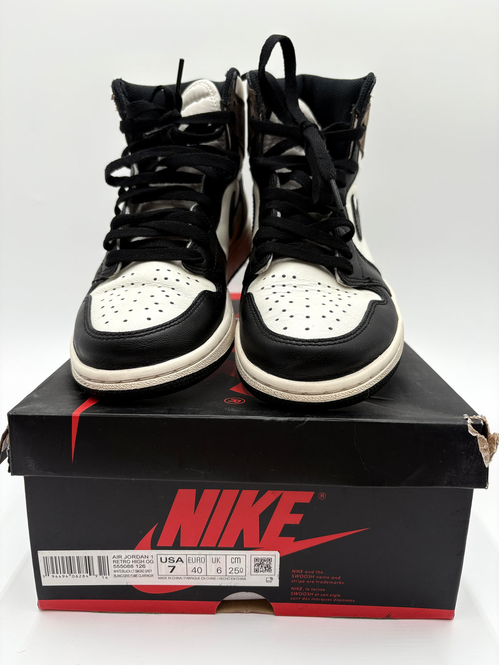 Black and white Air Jordan 1 Retro  High OG sneakers with a Nike box 