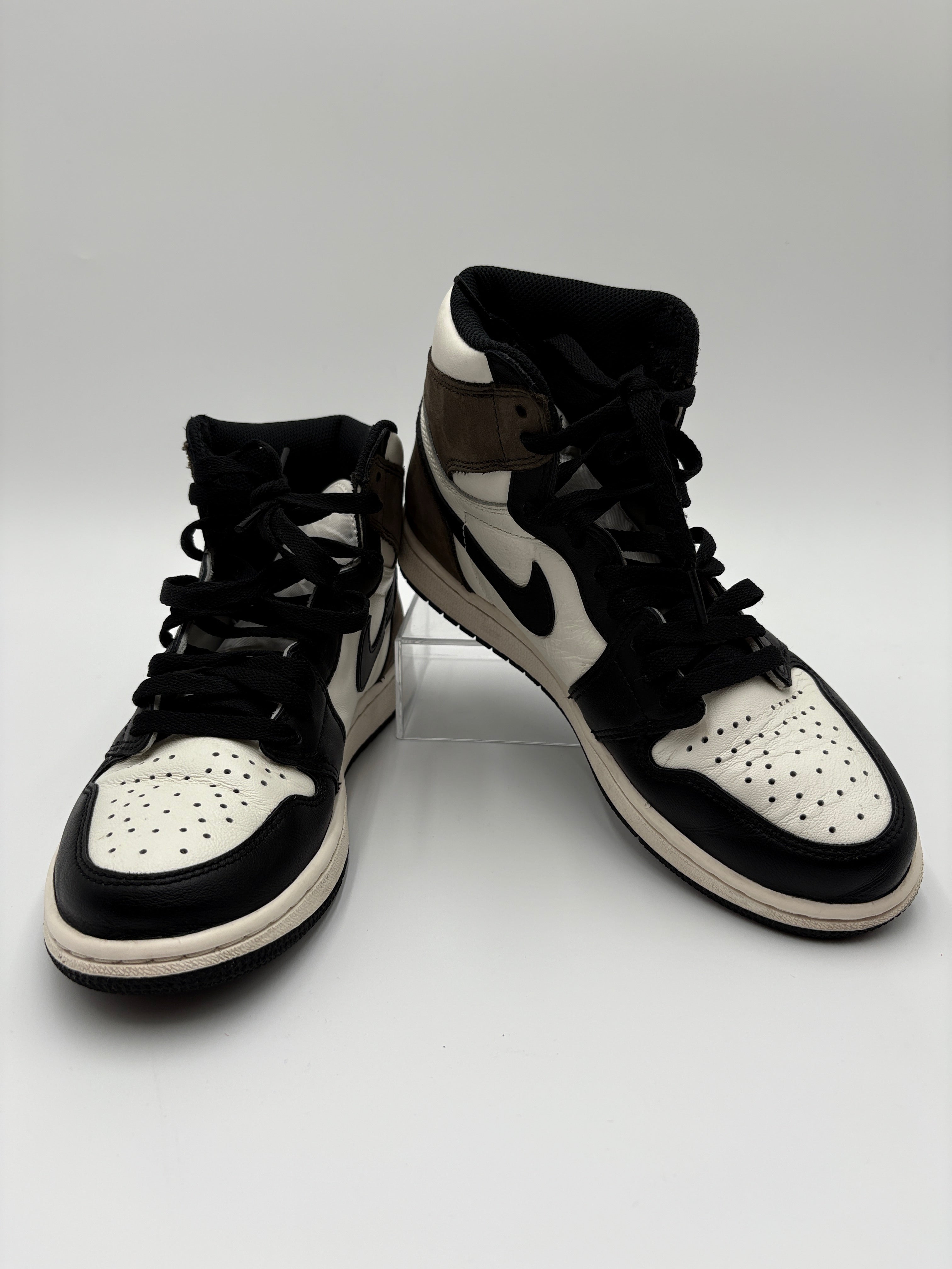 Nike Black and white with dark Mocha sneakers on a light gray background