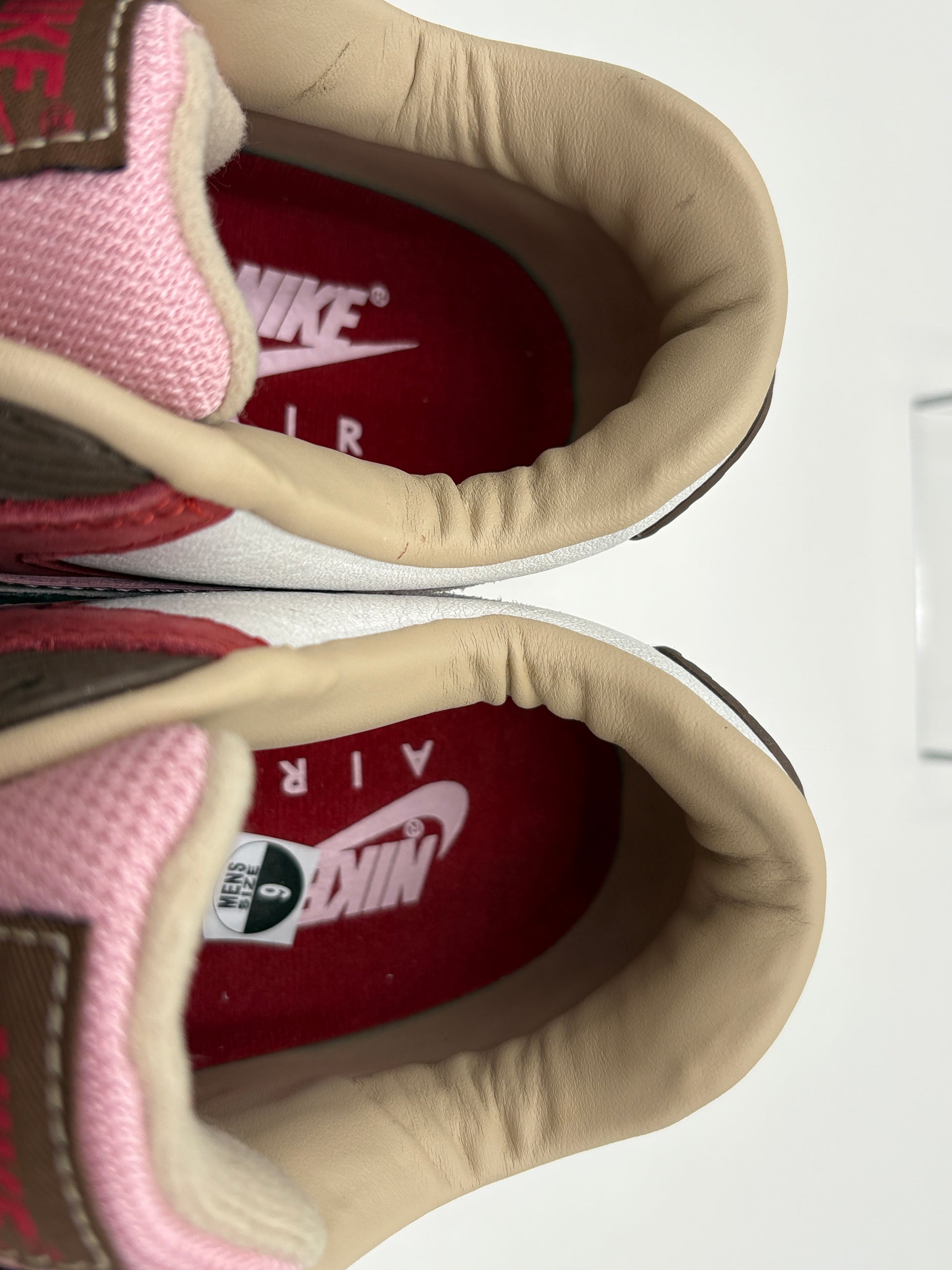 Close-up of a Nike sneaker with visible brand logo on a white background