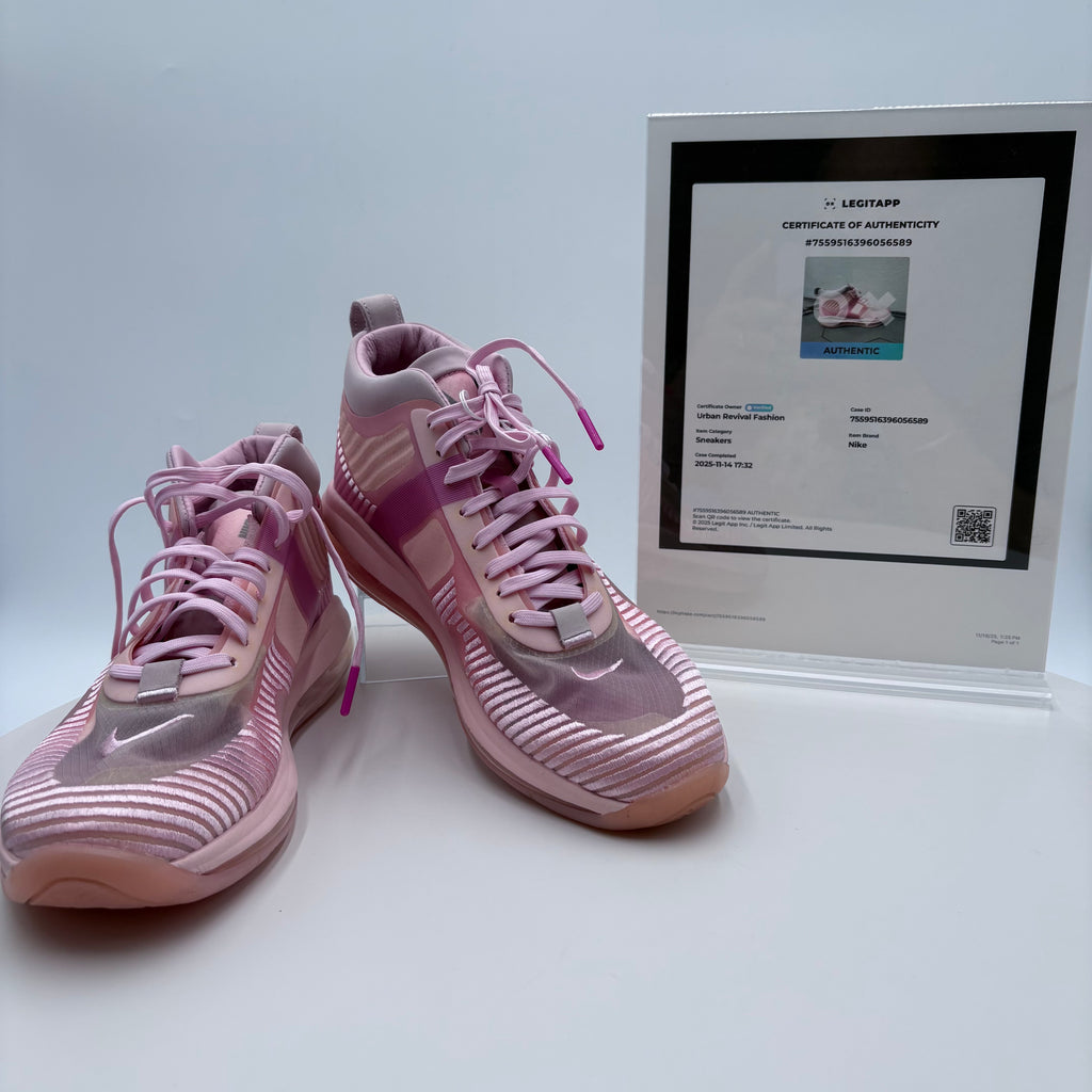 Pink sneakers with a certificate of authenticity on a light gray background