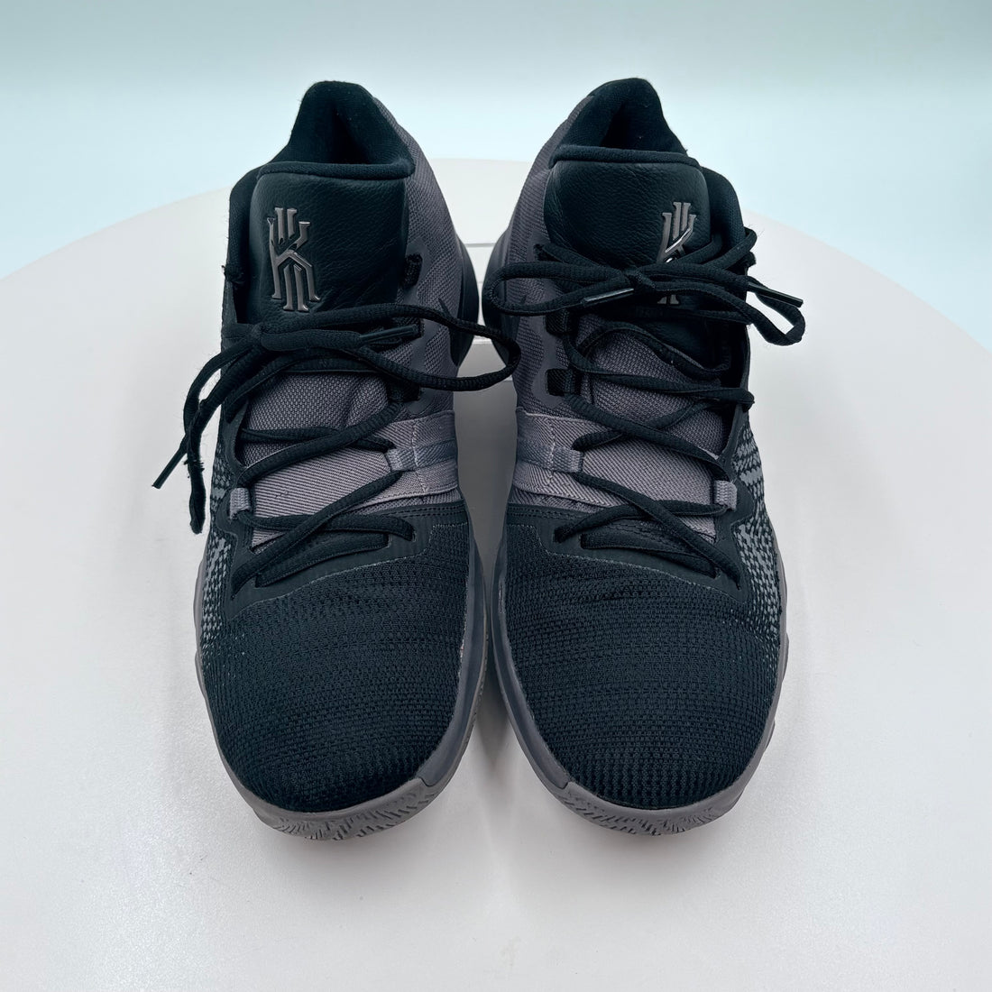 Pair of black and gray sneakers on a white background