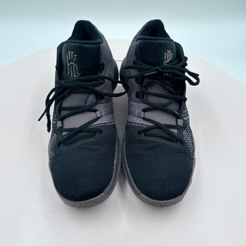 Pair of black and gray sneakers on a white background