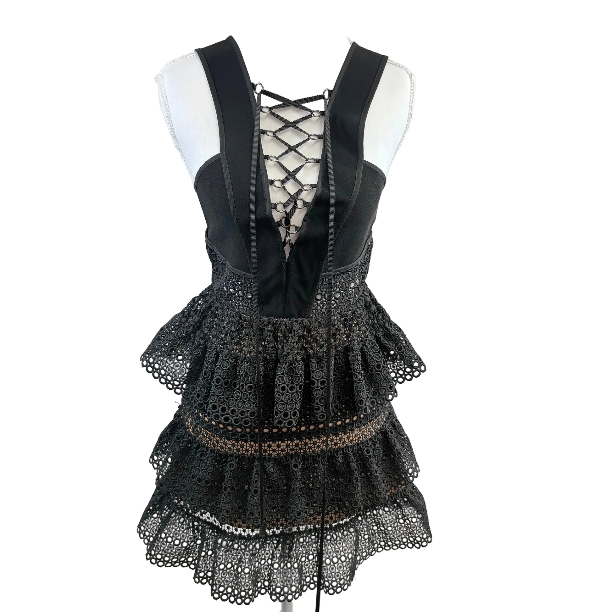 Black lace dress with a white background
