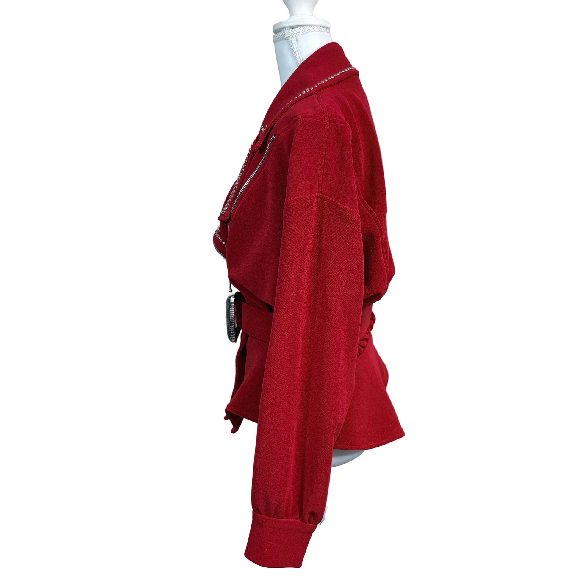 Red jacket on a mannequin against a white background