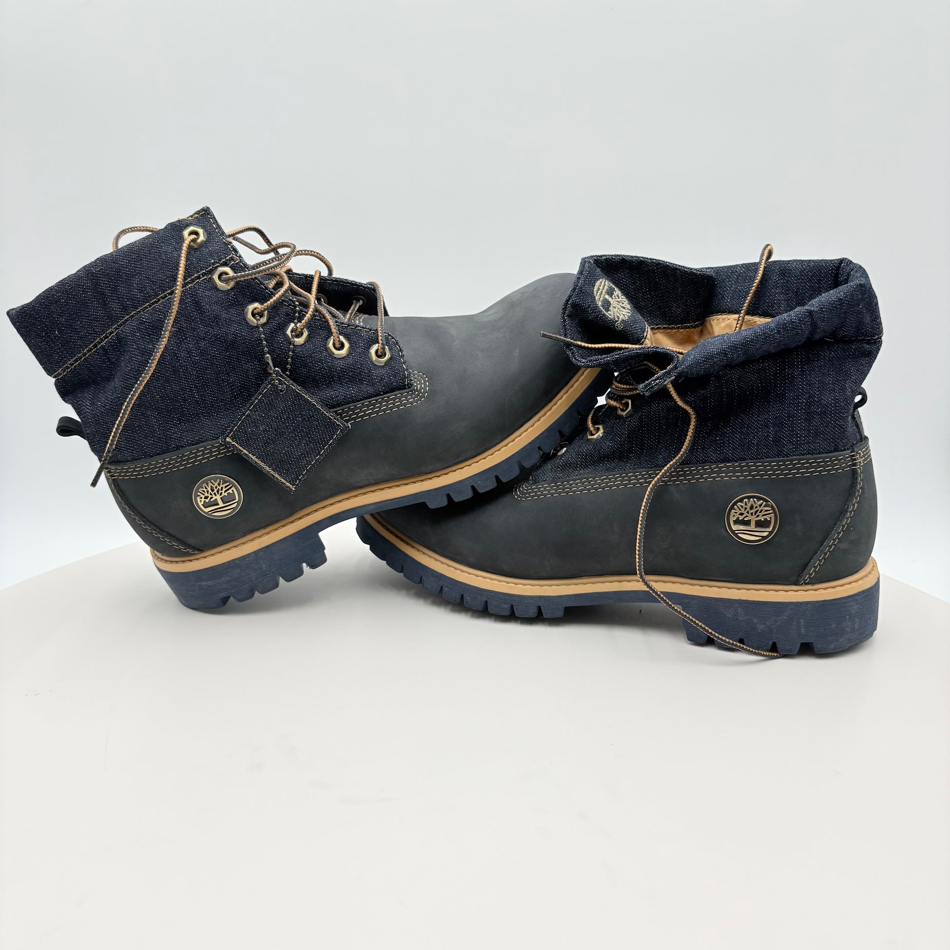 Pair of blue Timberland boots on a white background