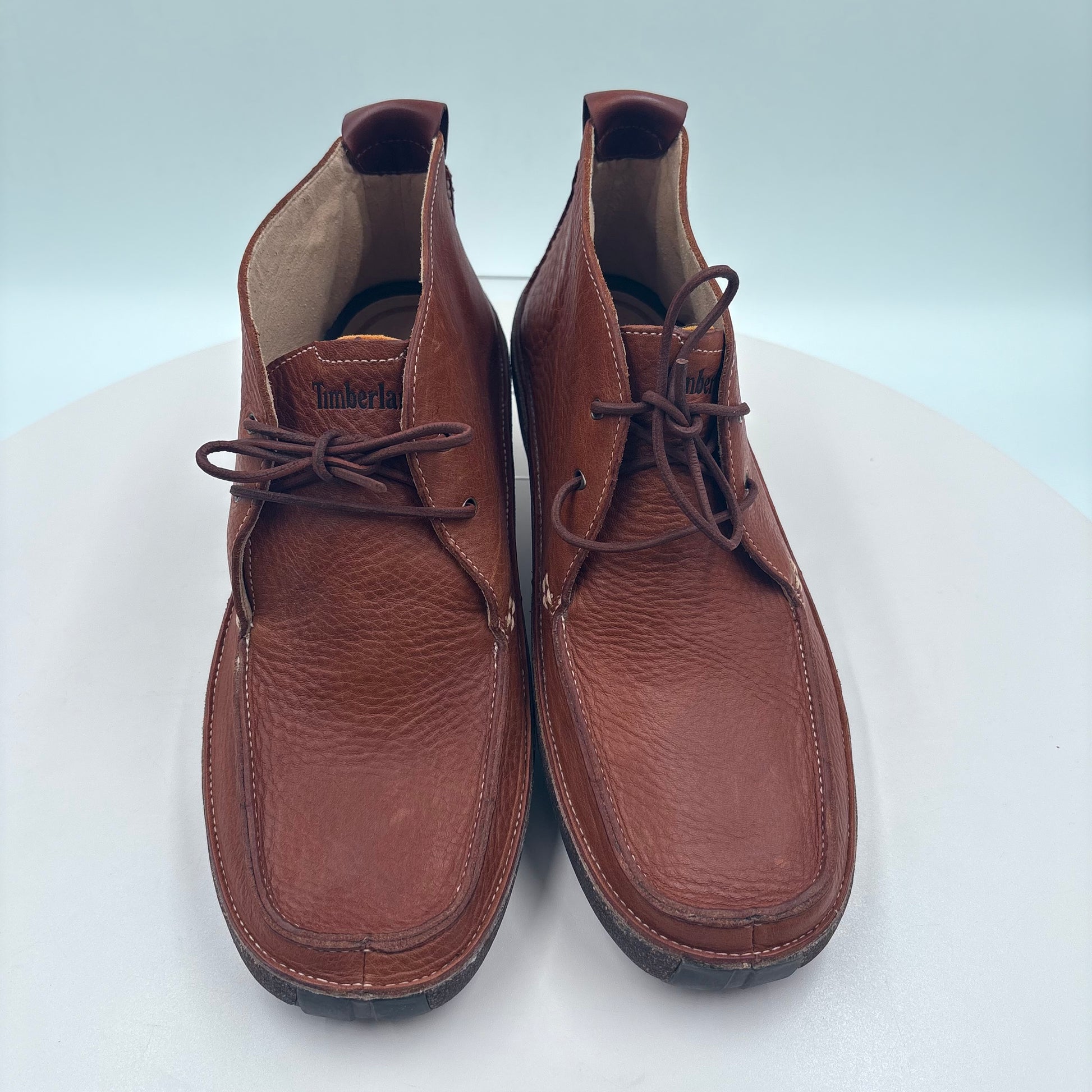 Pair of brown leather shoes on a white background