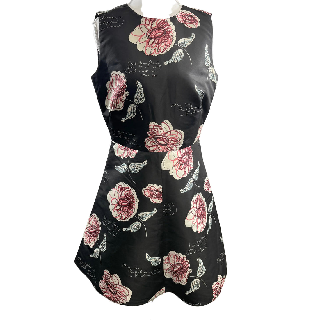 Black dress with pink floral patterns on a white background