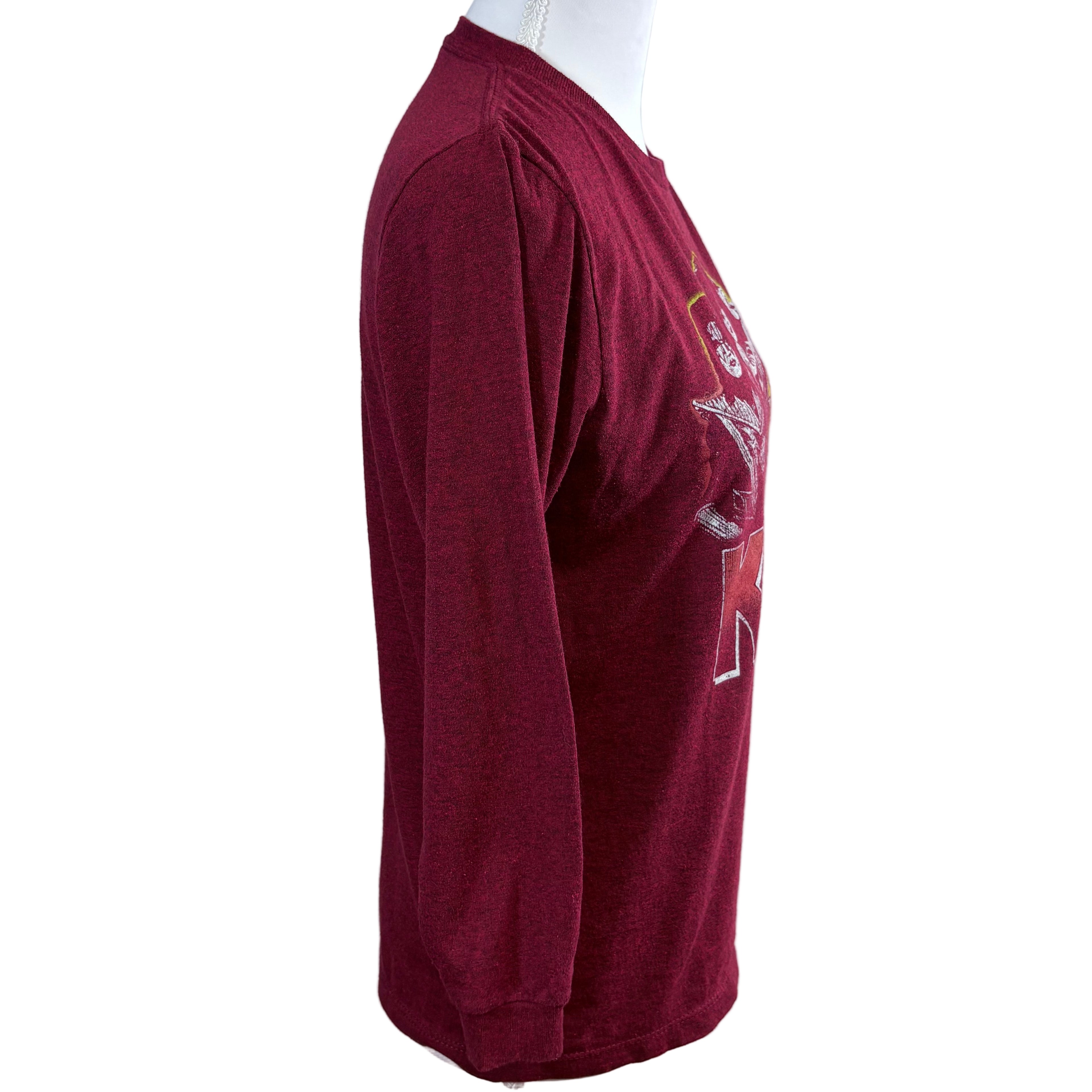 Maroon long-sleeve shirt on a mannequin against a white background