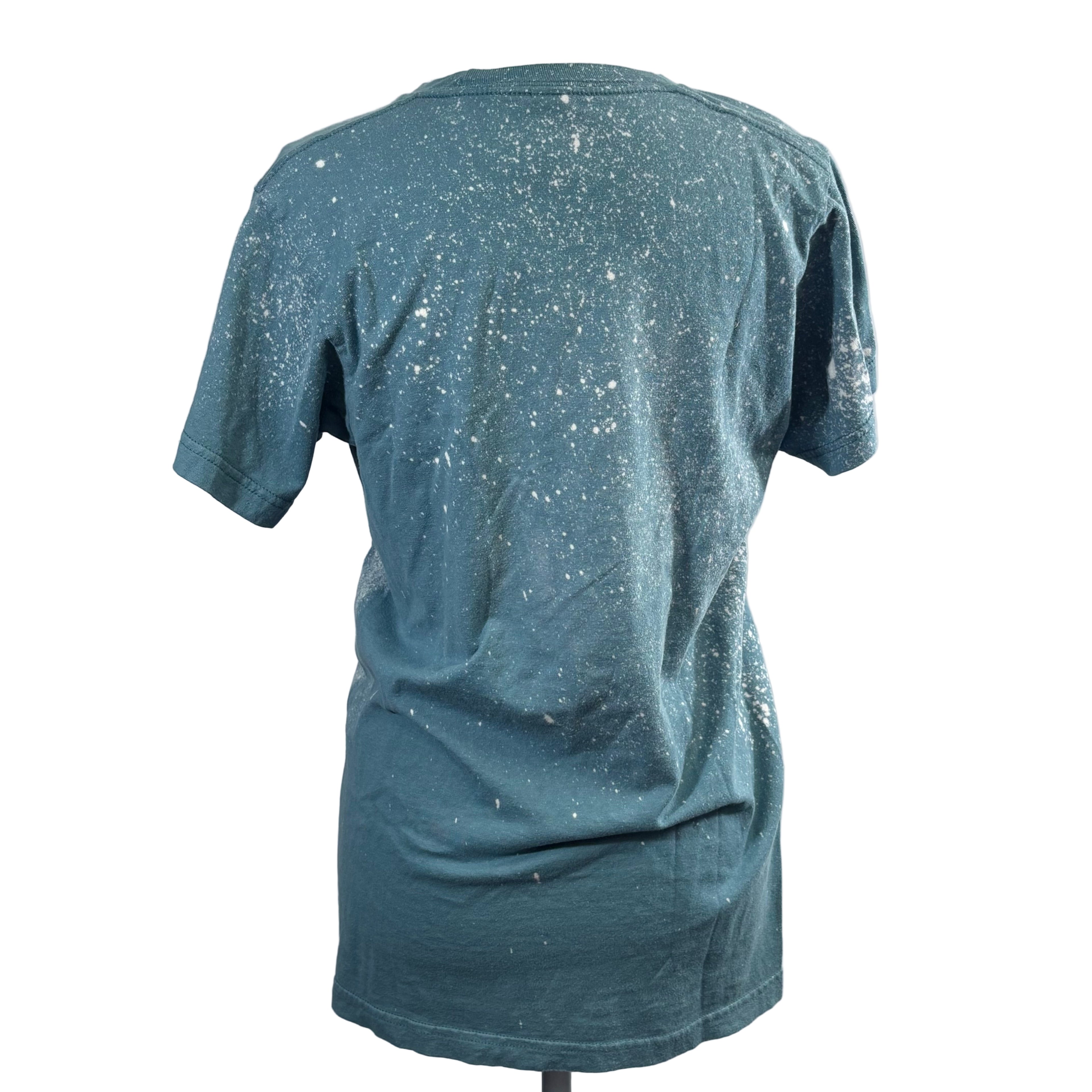 Blue t-shirt with star pattern on a white background