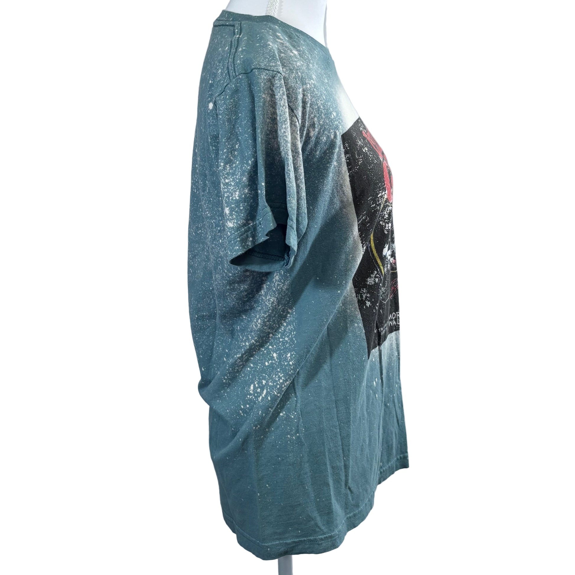 Blue glittery dress on a mannequin against a white background
