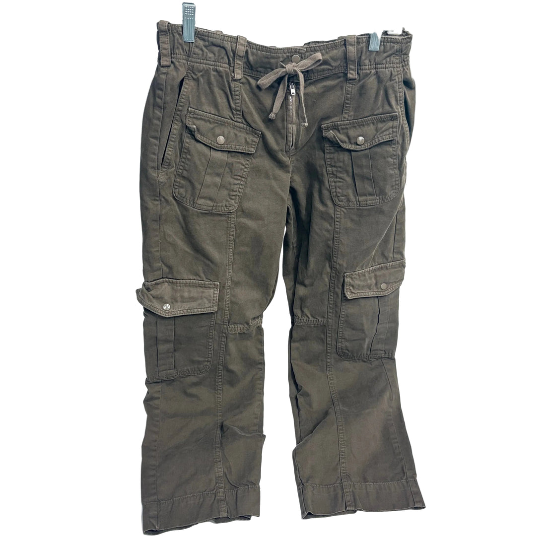 Green cargo pants on a white background