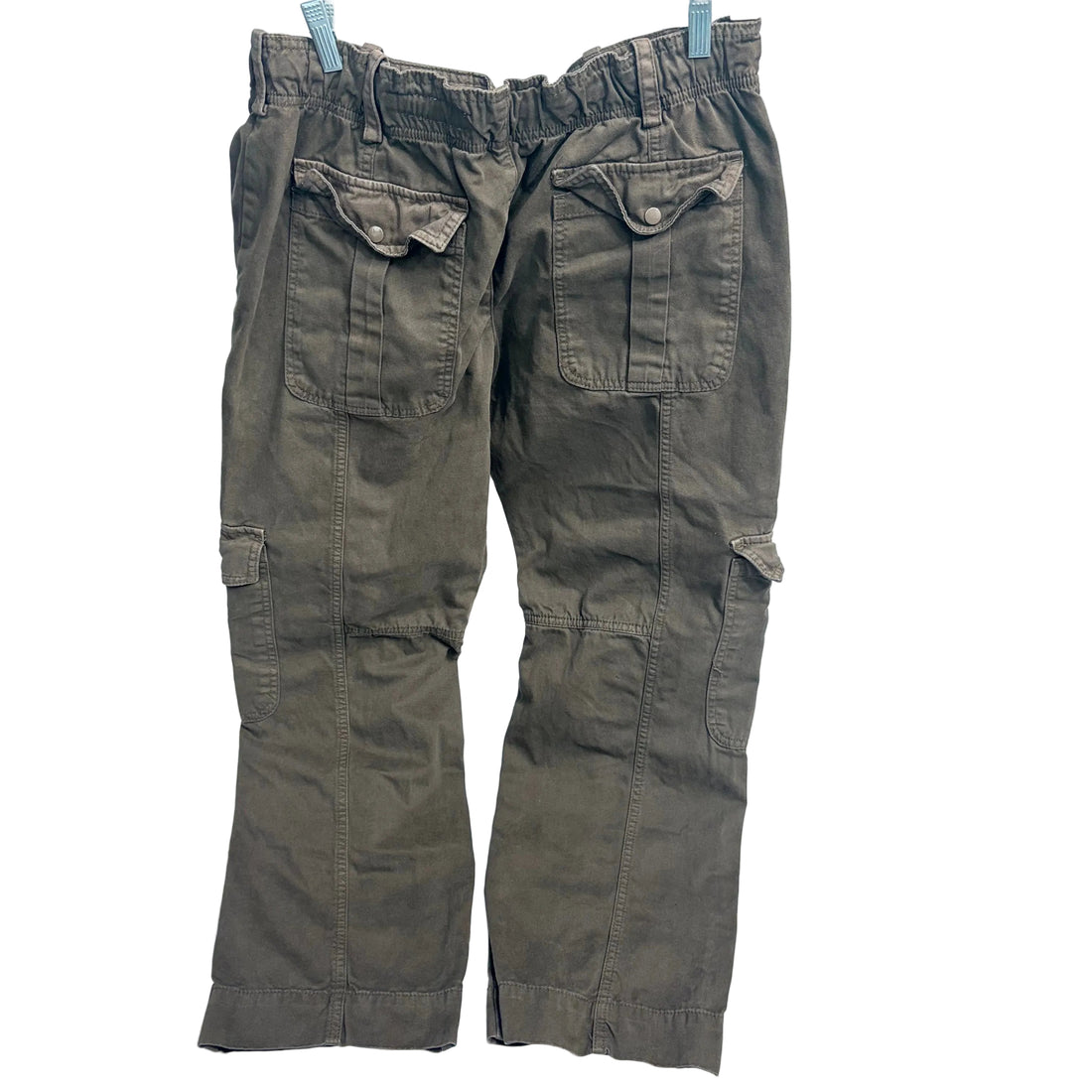 Green cargo pants on a white background