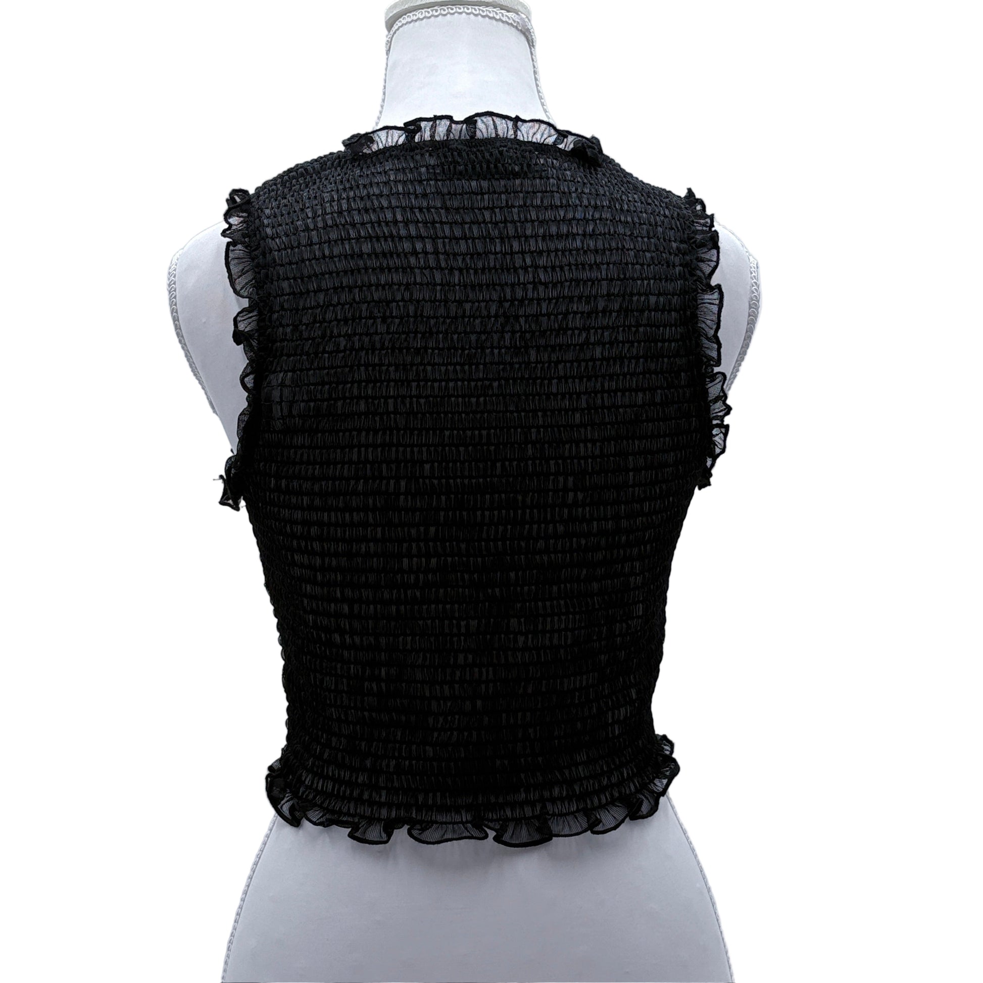 Black textured sheer sleeveless top on a mannequin against a light gray background
